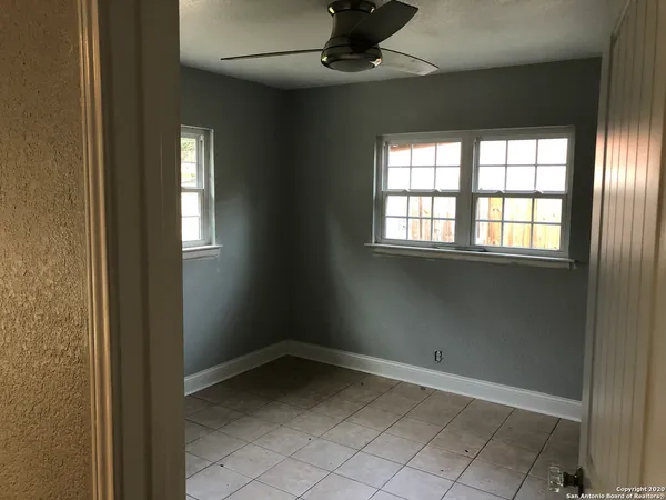 a kitchen with stainless steel appliances granite countertop a refrigerator and a stove