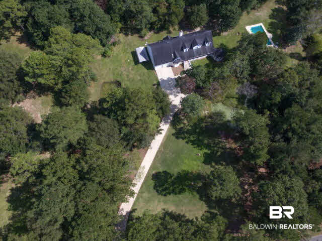 18700 East River Road South Silverhill, AL 36576 - Photo 4 of 32 Home sits on 3 acres and has 2 ponds and a pool!
