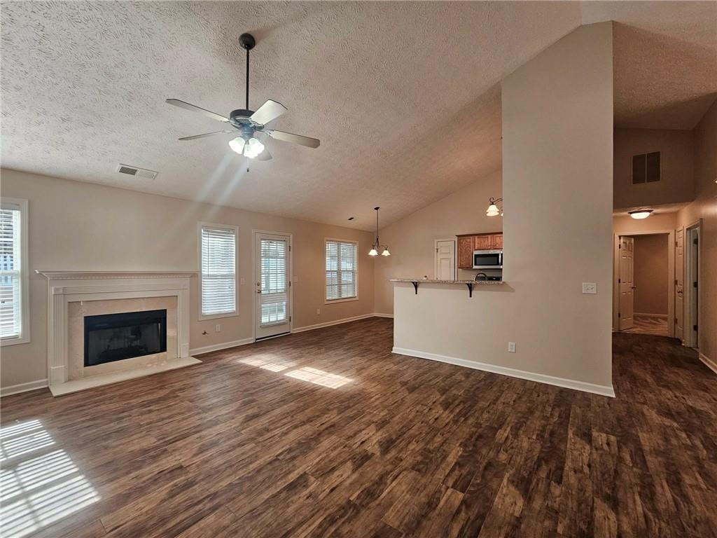 190 Berkley Drive Villa Rica, GA 30180 - Photo 11 of 38 a view of an empty room with window and fire place