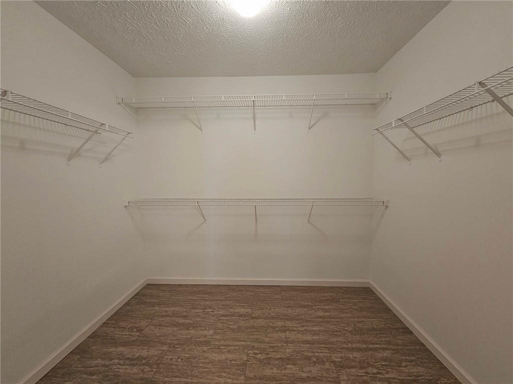 190 Berkley Drive Villa Rica, GA 30180 - Photo 27 of 38 a view of a room with racks on the wall