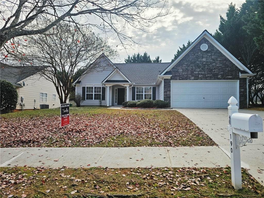 190 Berkley Drive Villa Rica, GA 30180 - Photo 4 of 38 front view of a house with a yard