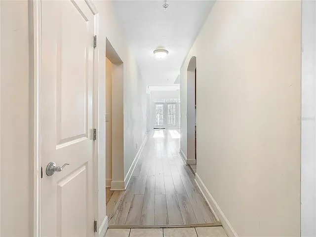 a kitchen with stainless steel appliances a sink and cabinets