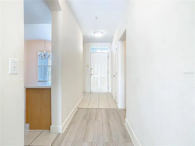 a kitchen with a stove a sink and a microwave