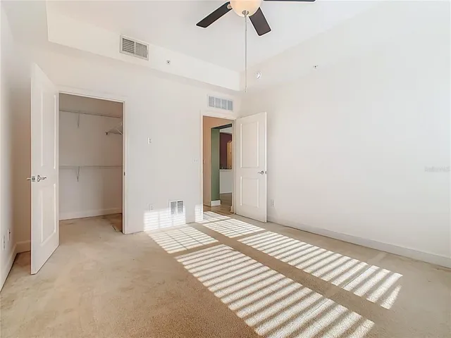 a bathroom with a shower and a toilet