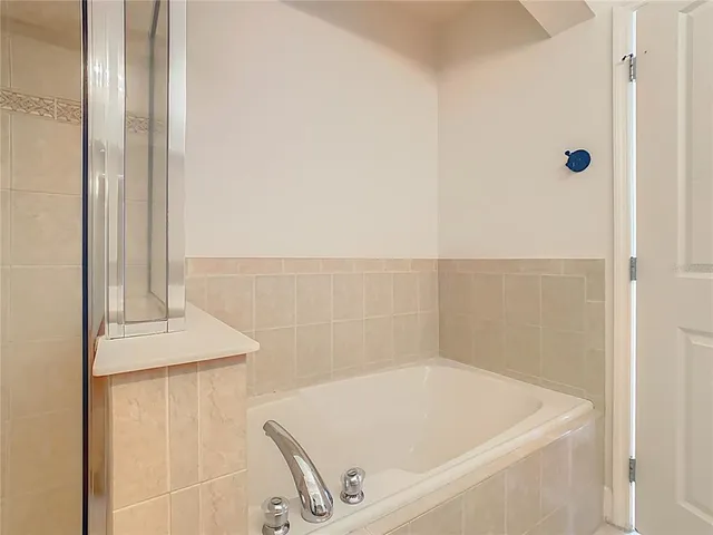 an aerial view of a house with outdoor space