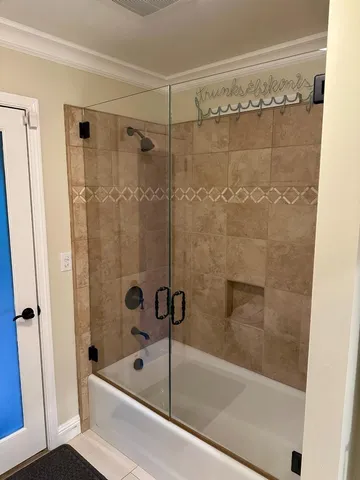 a view of a swimming pool with a yard and trees