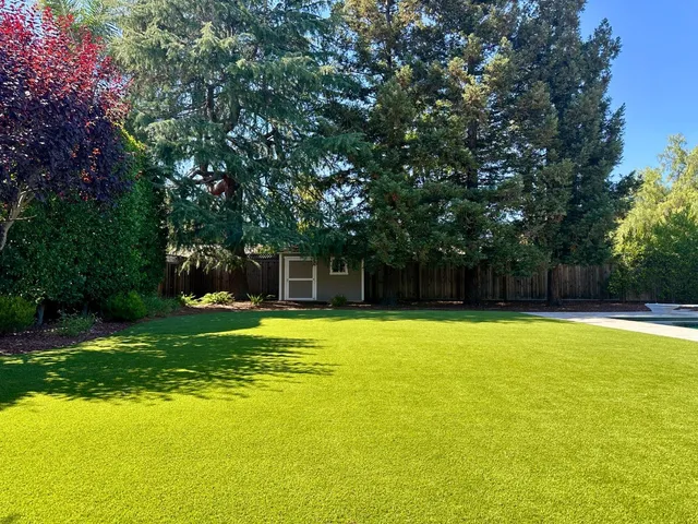 a outdoor living space with furniture and garden view