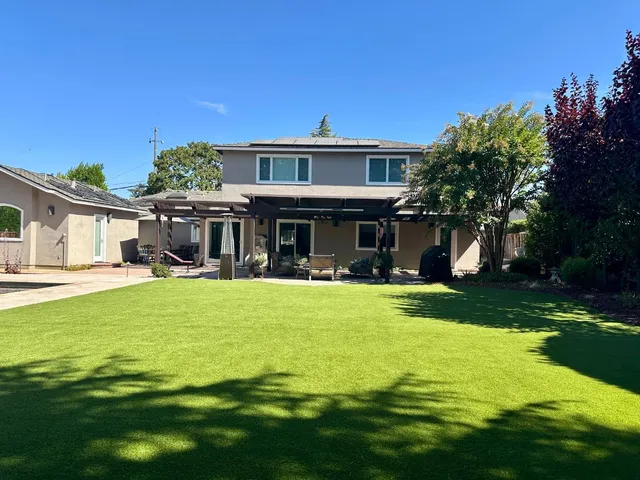 a view of a swimming pool with a patio