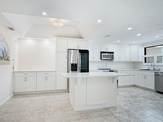 6081 Southeast Landing Way, Unit 6 Stuart, FL 34997 - Photo 3 of 37 IMG_2738