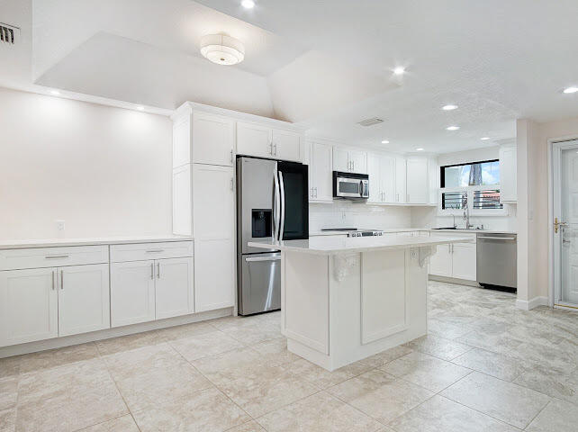 6081 Southeast Landing Way, Unit 6 Stuart, FL 34997 - Photo 5 of 37 IMG_2737