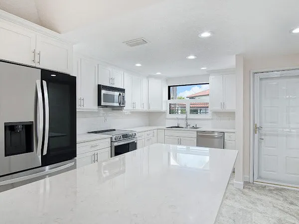 $410,000 | 6081 Southeast Landing Way, Unit 6, Stuart, FL 34997