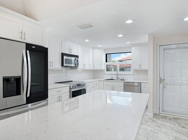 6081 Southeast Landing Way, Unit 6 Stuart, FL 34997 - Photo 6 of 37 IMG_2739