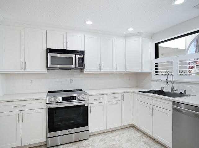 6081 Southeast Landing Way, Unit 6 Stuart, FL 34997 - Photo 7 of 37 IMG_2740