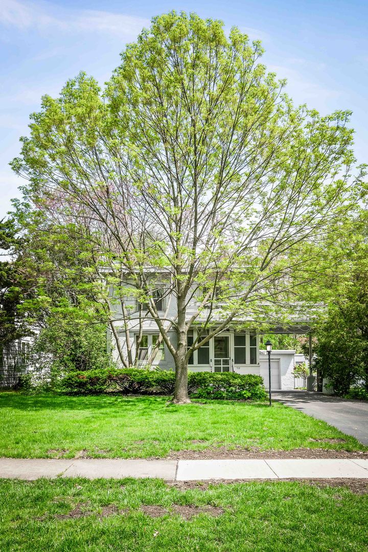 710 Normal Avenue Normal, IL 61761 - Photo 2 of 39 a front view of a house with a yard