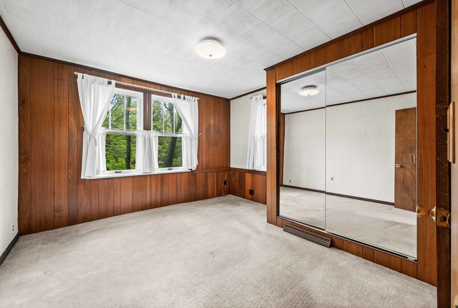710 Normal Avenue Normal, IL 61761 - Photo 23 of 39 a view of an empty room with a window
