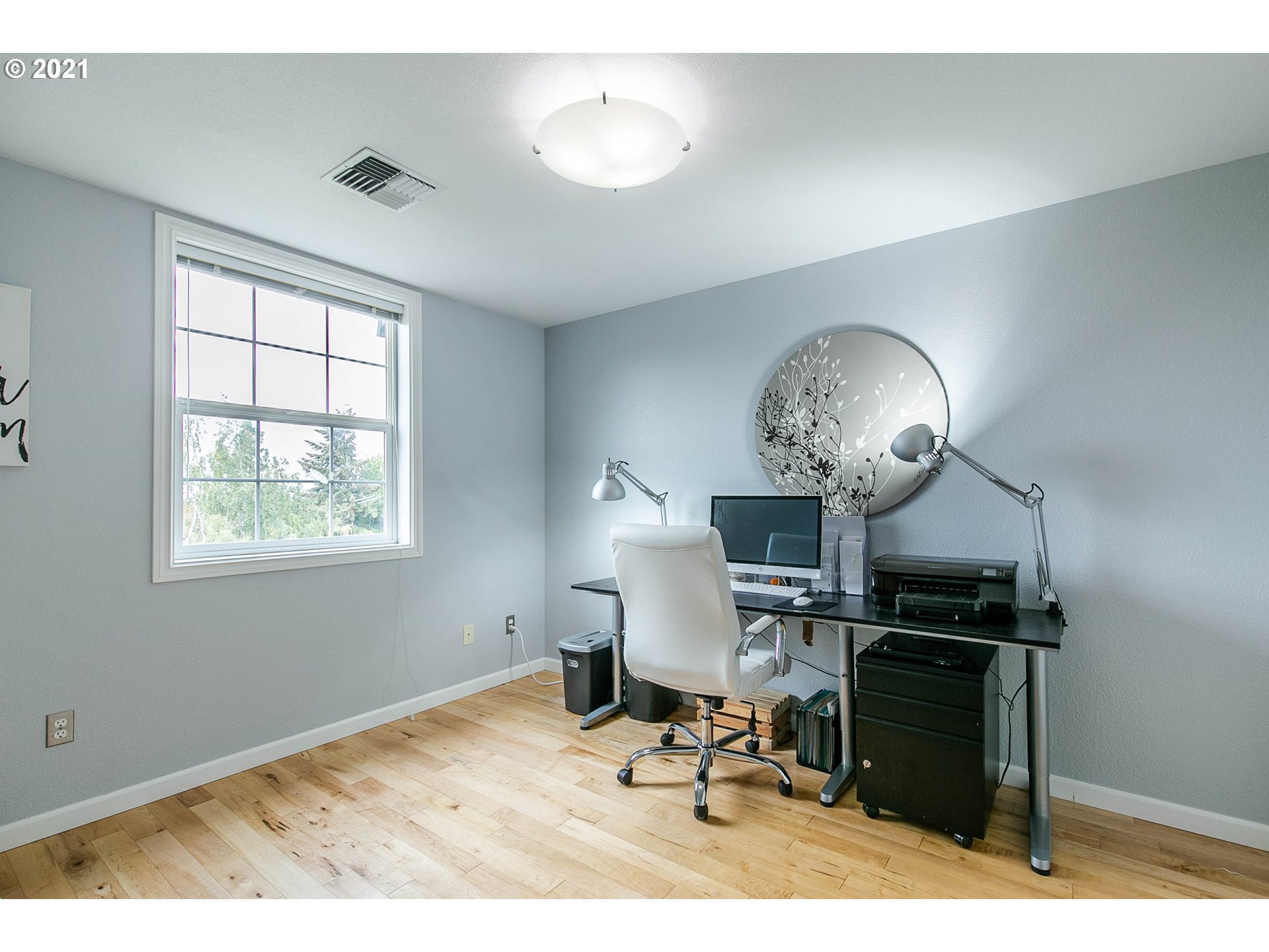 923 Prescott Lane Springfield, OR 97477 - Photo 23 of 32 a view of a workspace with furniture and a window