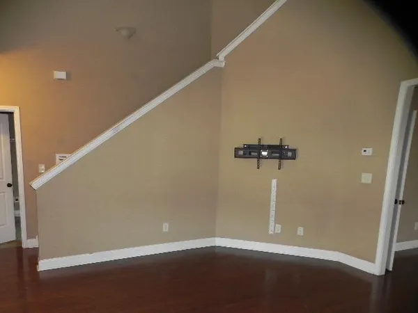 an empty room with a hallway