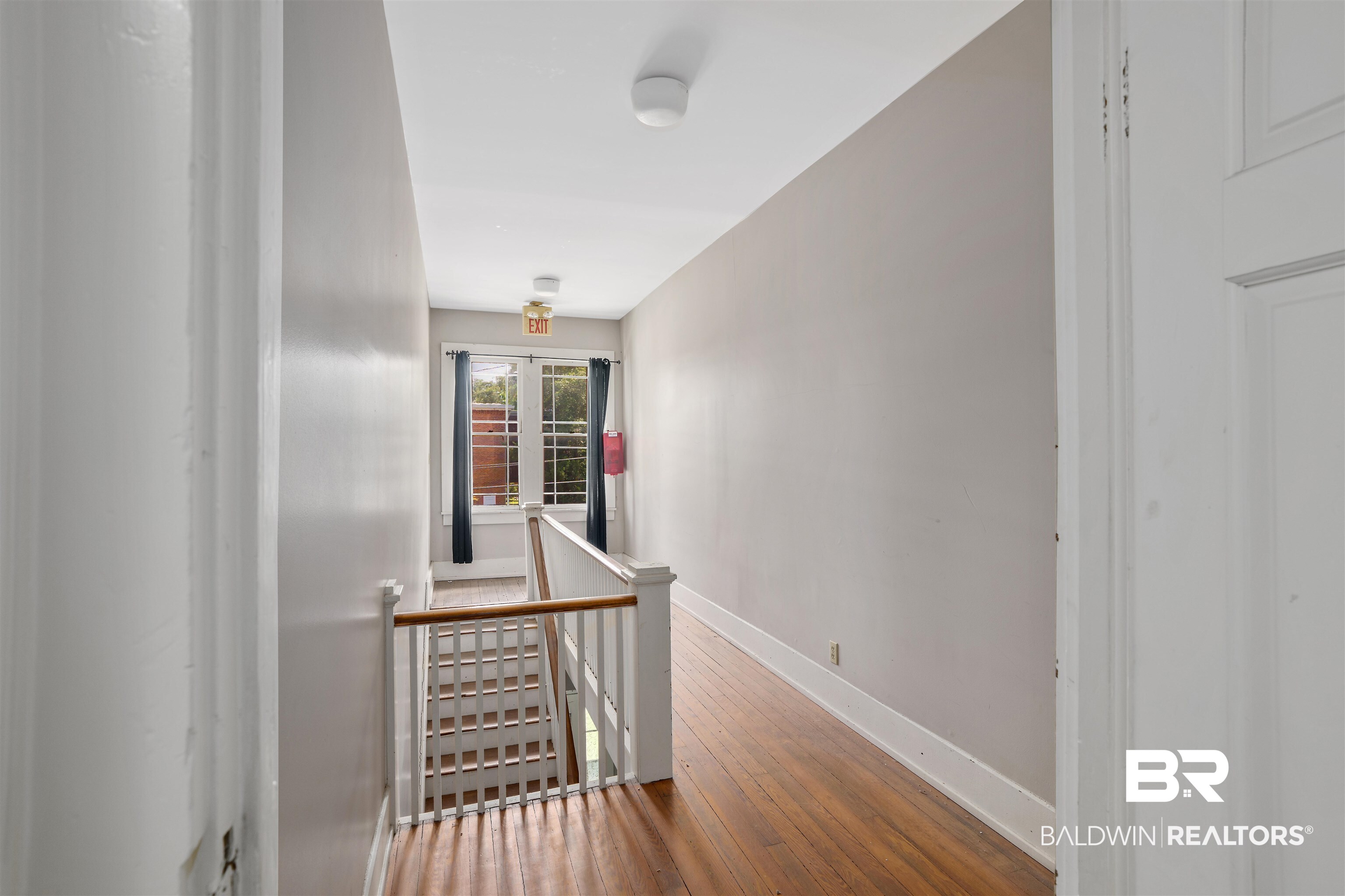 1010 Dauphin Street Mobile, AL 36604 - Photo 22 of 22 Corridor with wood-type flooring