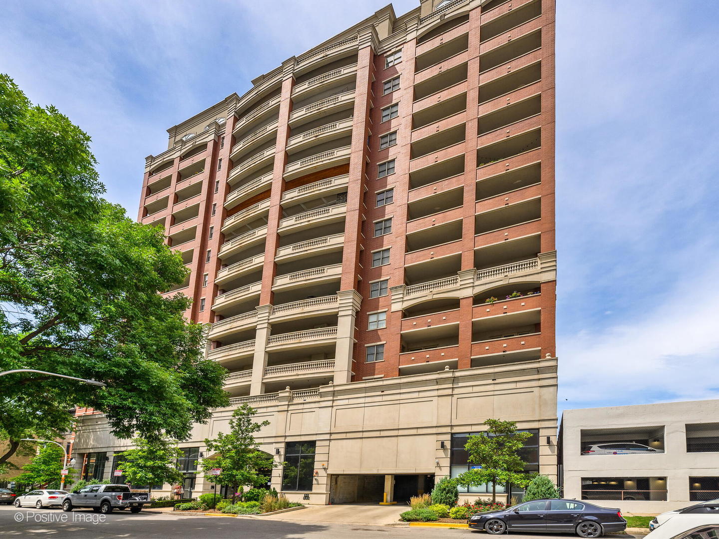 828 West Grace Street, Unit 508 Chicago, IL 60613 - Photo 1 of 15 a front view of a building with street view