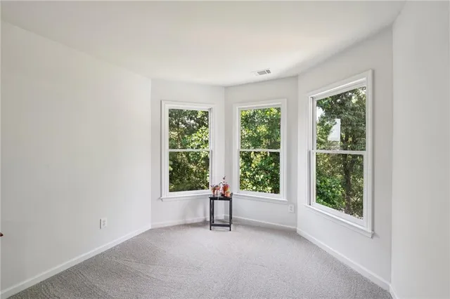 a view of a room with large window