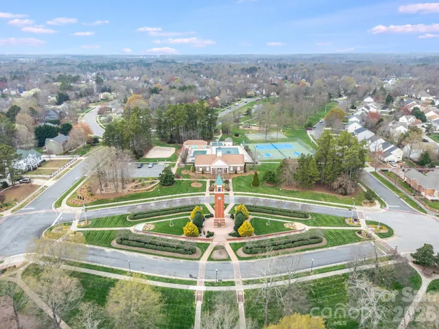 a view of a house with a big yard