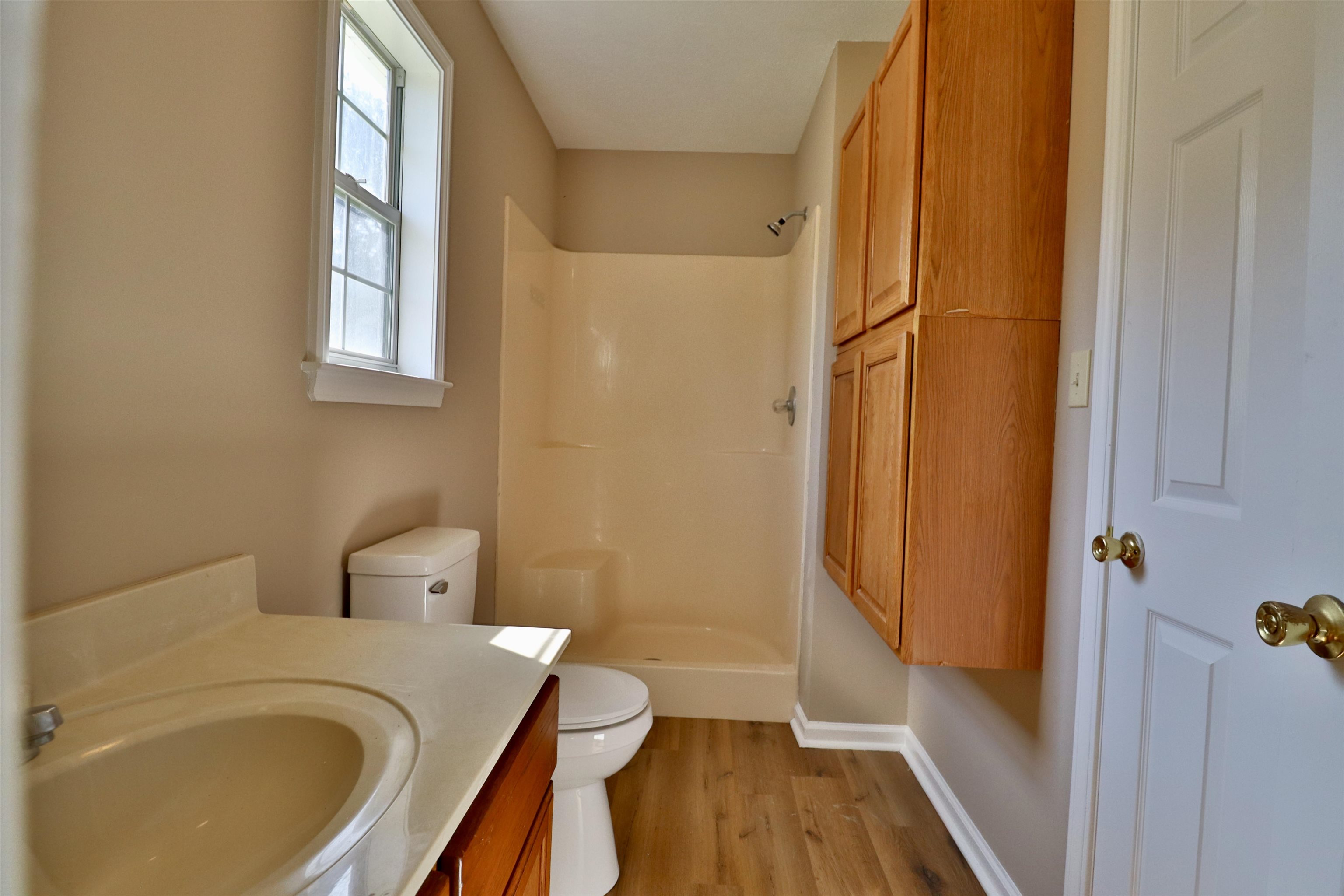 1714 Conner Whitefield Road Ripley, TN 38063 - Photo 12 of 37 a bathroom with a sink a toilet and tub
