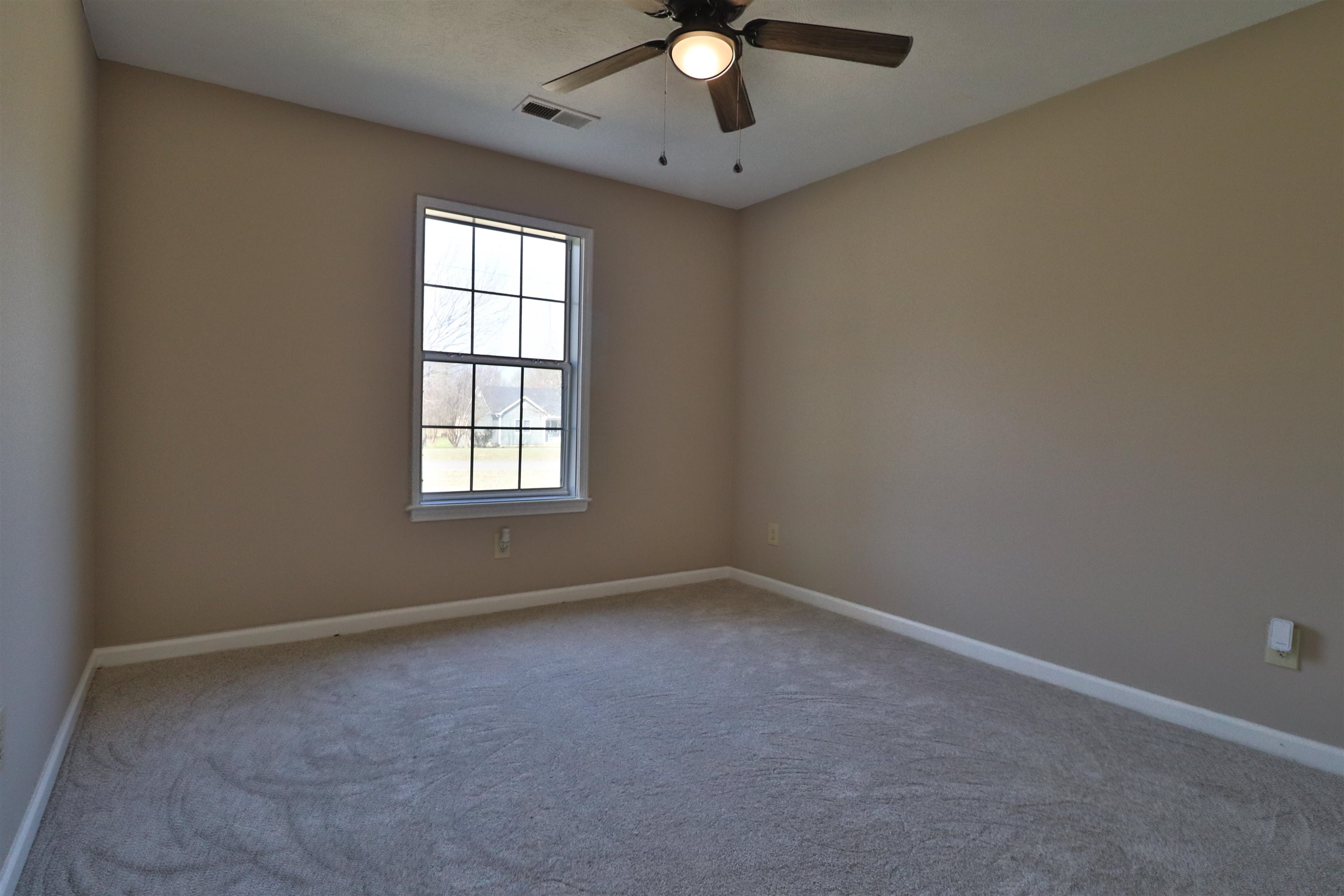 1714 Conner Whitefield Road Ripley, TN 38063 - Photo 19 of 37 an empty room with a window