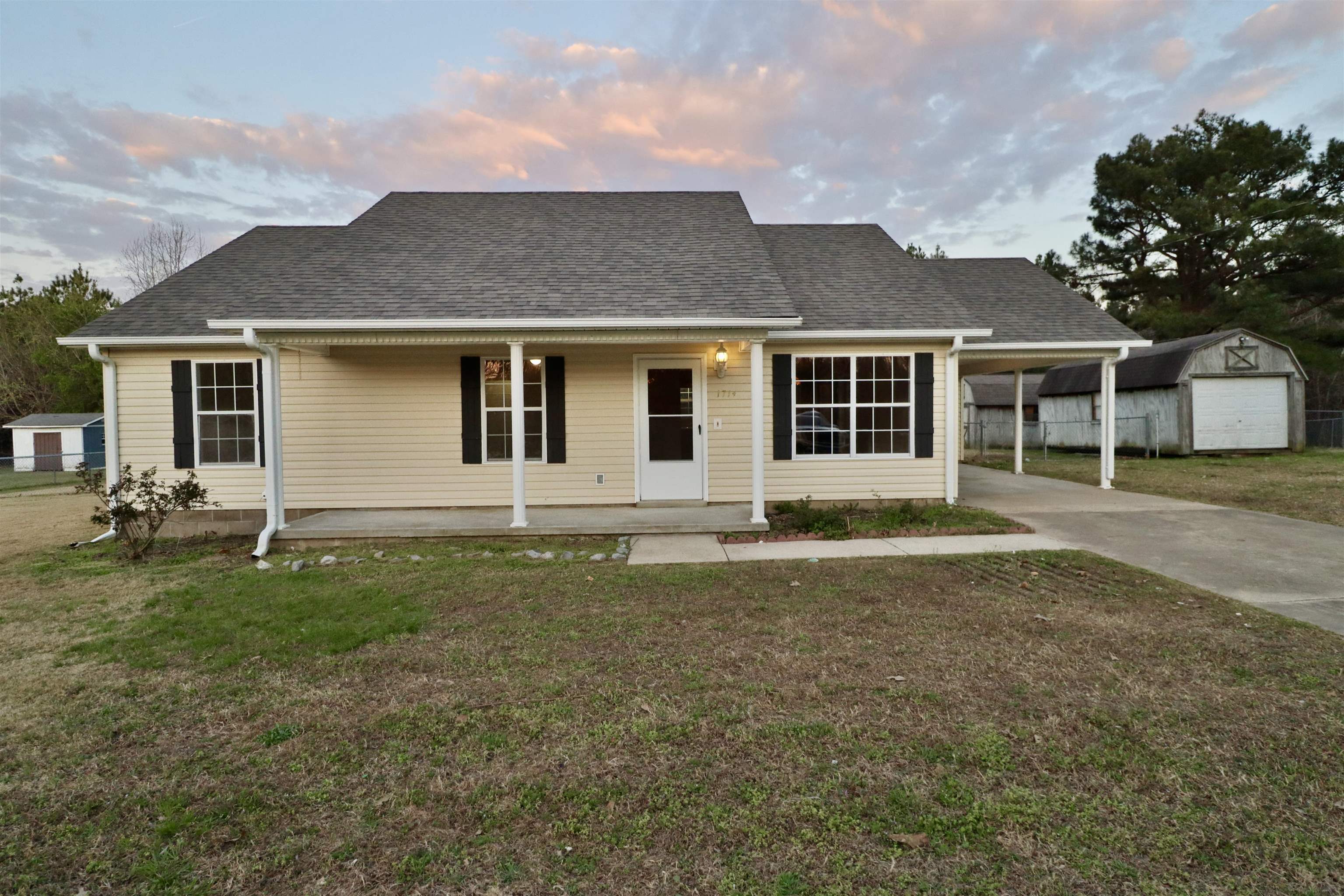 1714 Conner Whitefield Road Ripley, TN 38063 - Photo 2 of 37 front view of a house with a yard