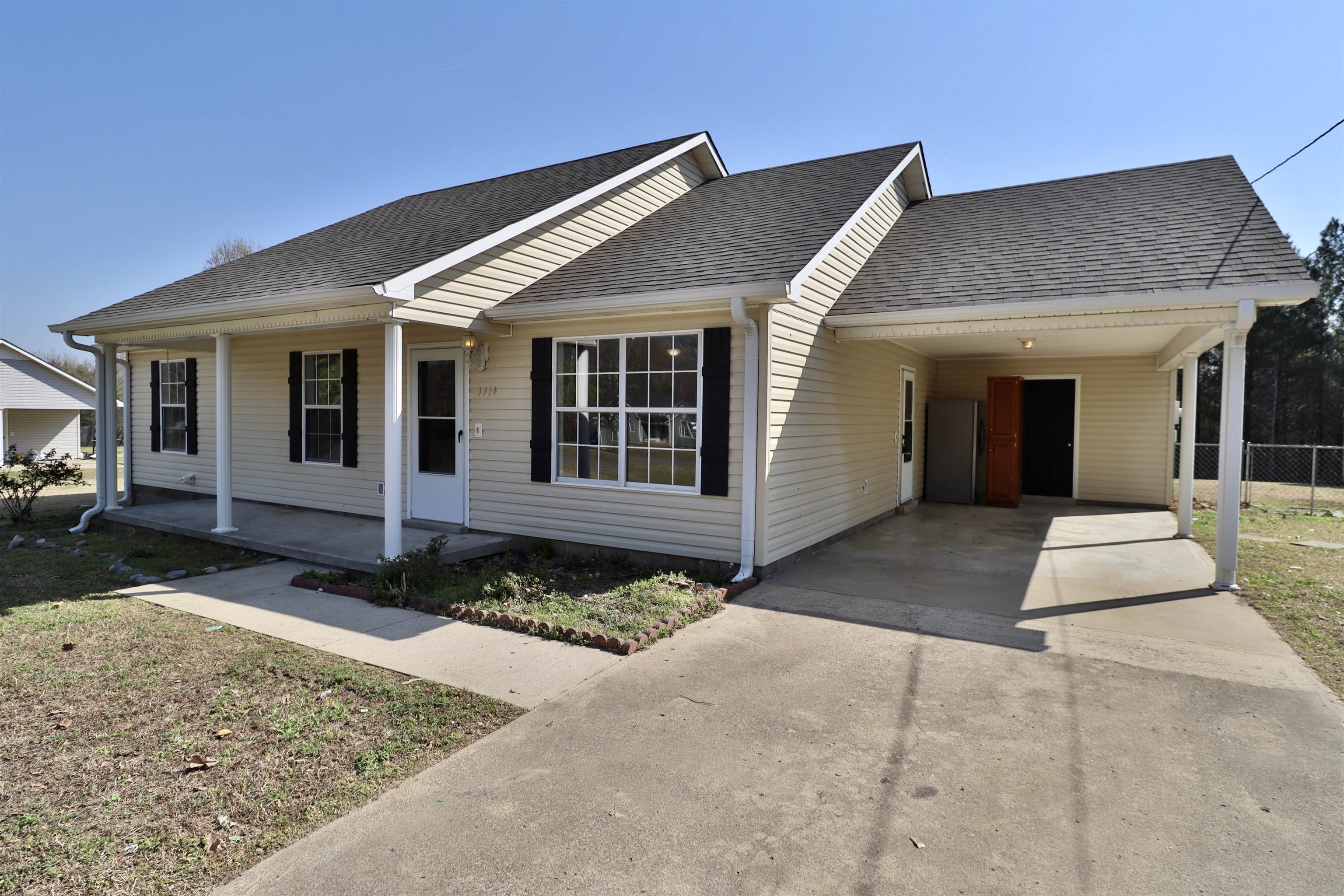 1714 Conner Whitefield Road Ripley, TN 38063 - Photo 28 of 37 a front view of a house with a yard