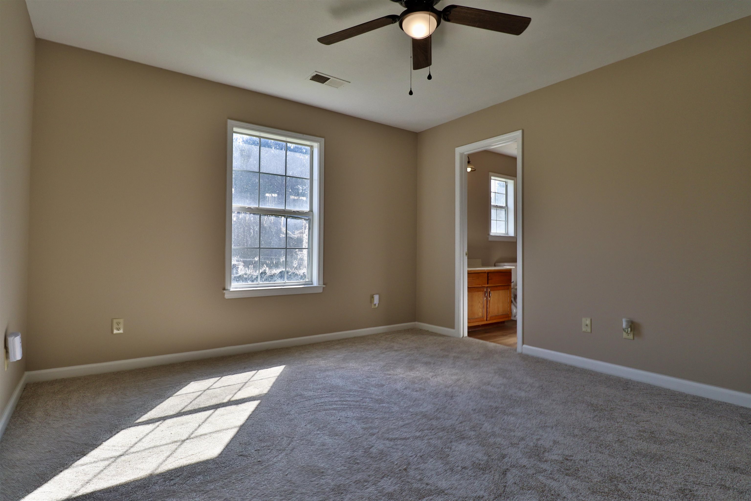1714 Conner Whitefield Road Ripley, TN 38063 - Photo 10 of 37 a view of an empty room with a window