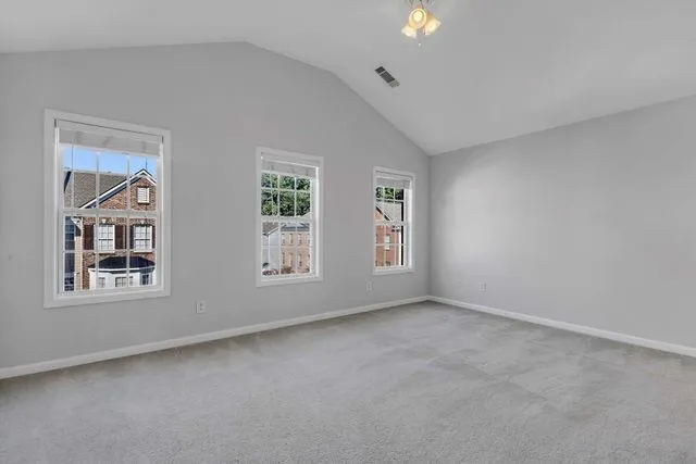 an empty room with windows