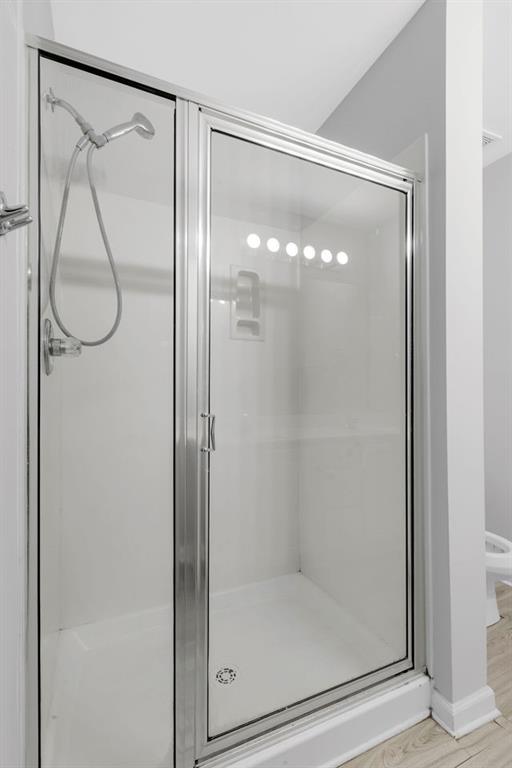 2979 Wintercrest Trace Atlanta, GA 30360 - Photo 13 of 22 a bathroom with a glass shower door
