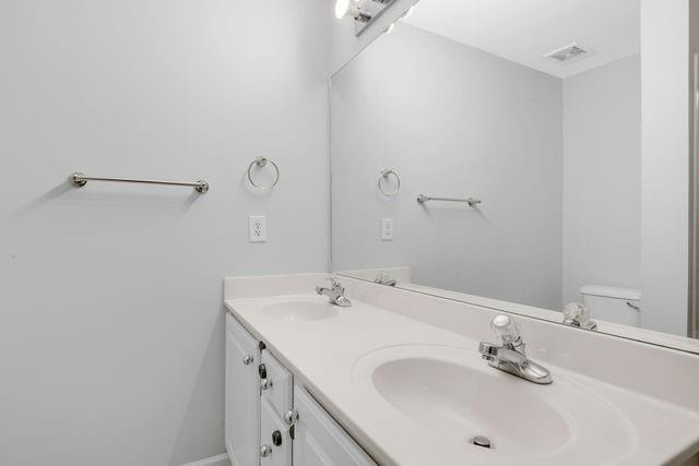 2979 Wintercrest Trace Atlanta, GA 30360 - Photo 14 of 22 a bathroom with a sink and a mirror