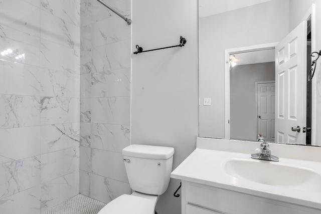 2979 Wintercrest Trace Atlanta, GA 30360 - Photo 21 of 22 a bathroom with a sink toilet and shower