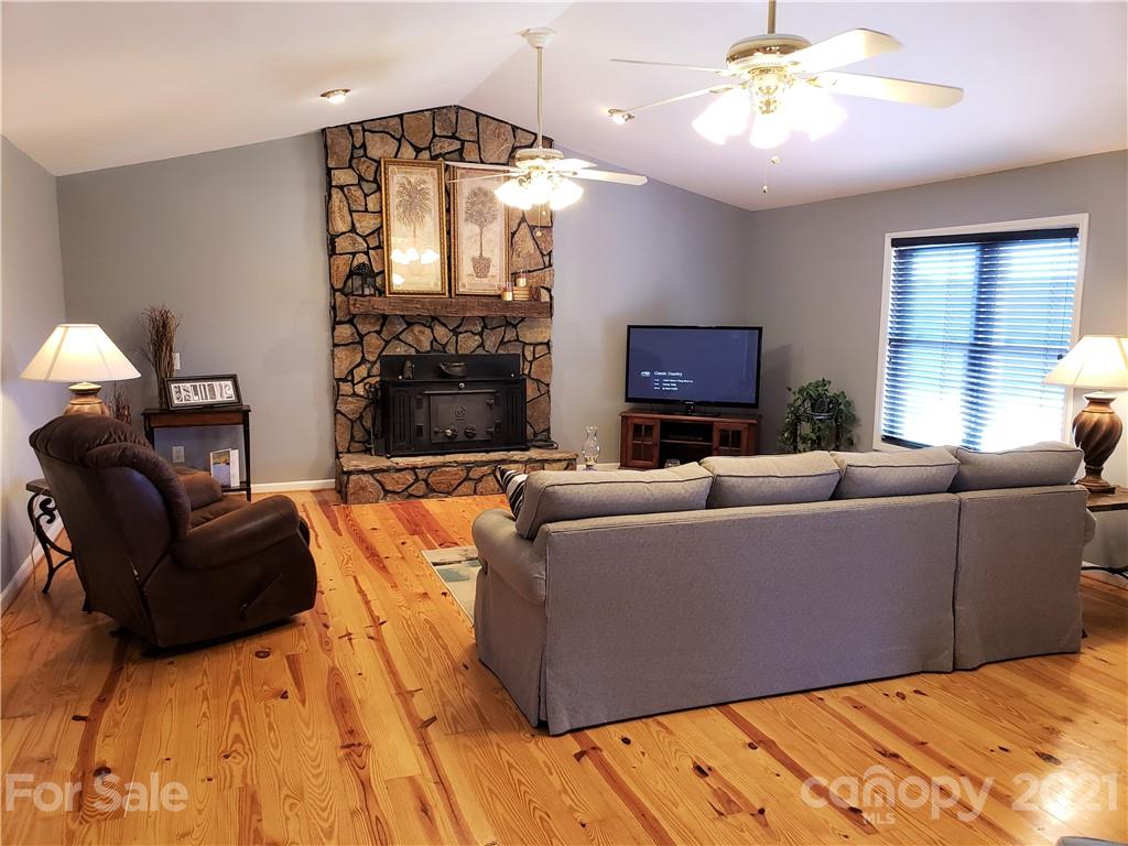 1770 Legion Road Hickory Grove, SC 29717 - Photo 11 of 48 a living room with furniture and a fireplace