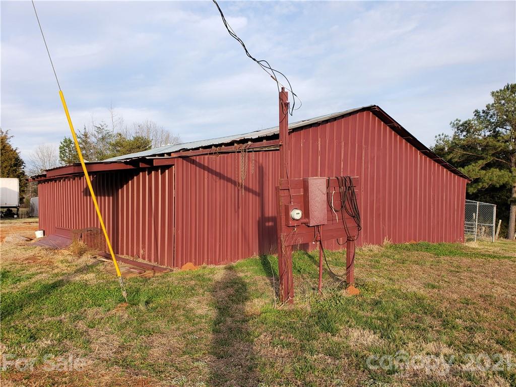 1770 Legion Road Hickory Grove, SC 29717 - Photo 25 of 48 a view of a backyard with grass and a fence