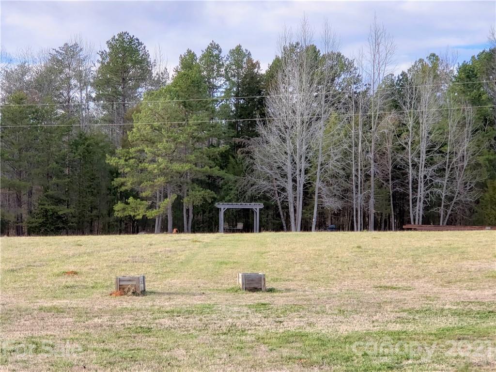 1770 Legion Road Hickory Grove, SC 29717 - Photo 33 of 48 a view of white house with a yard