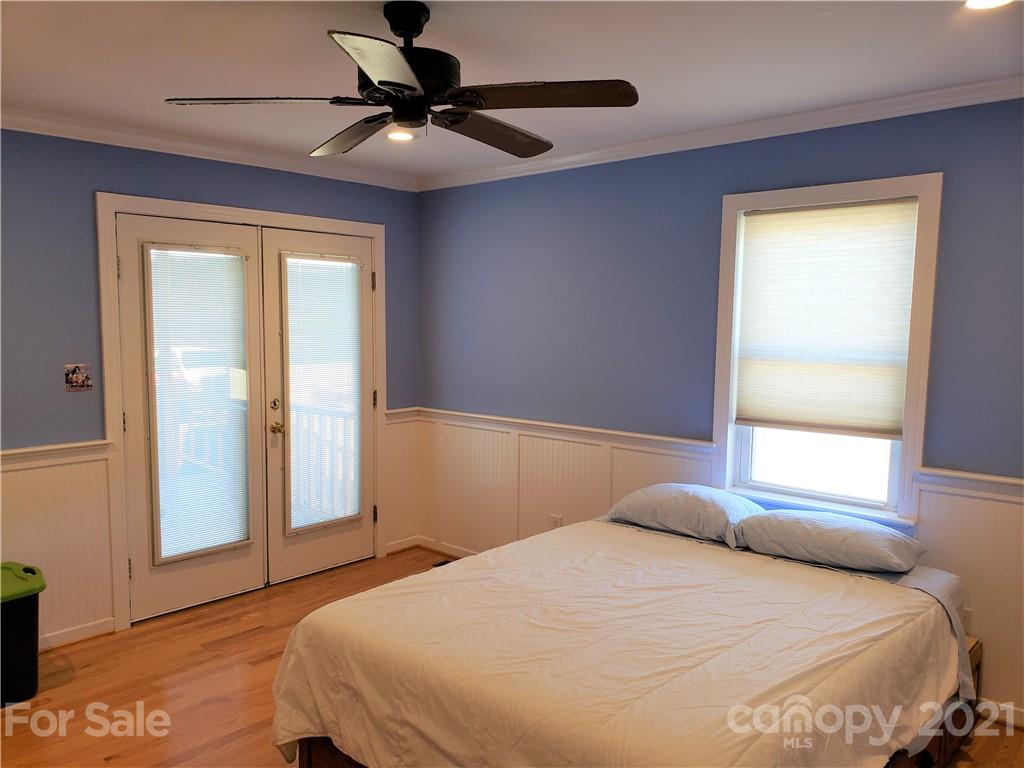 1770 Legion Road Hickory Grove, SC 29717 - Photo 39 of 48 a bedroom with a bed and a window