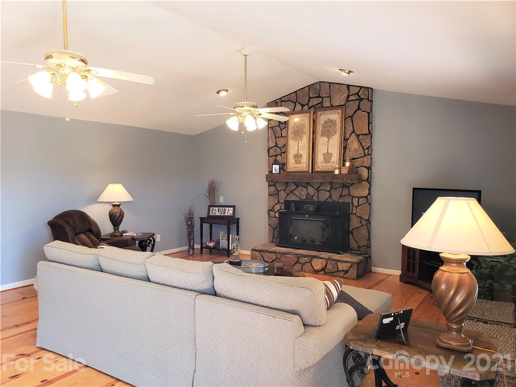 1770 Legion Road Hickory Grove, SC 29717 - Photo 9 of 48 a living room with furniture and a lamp
