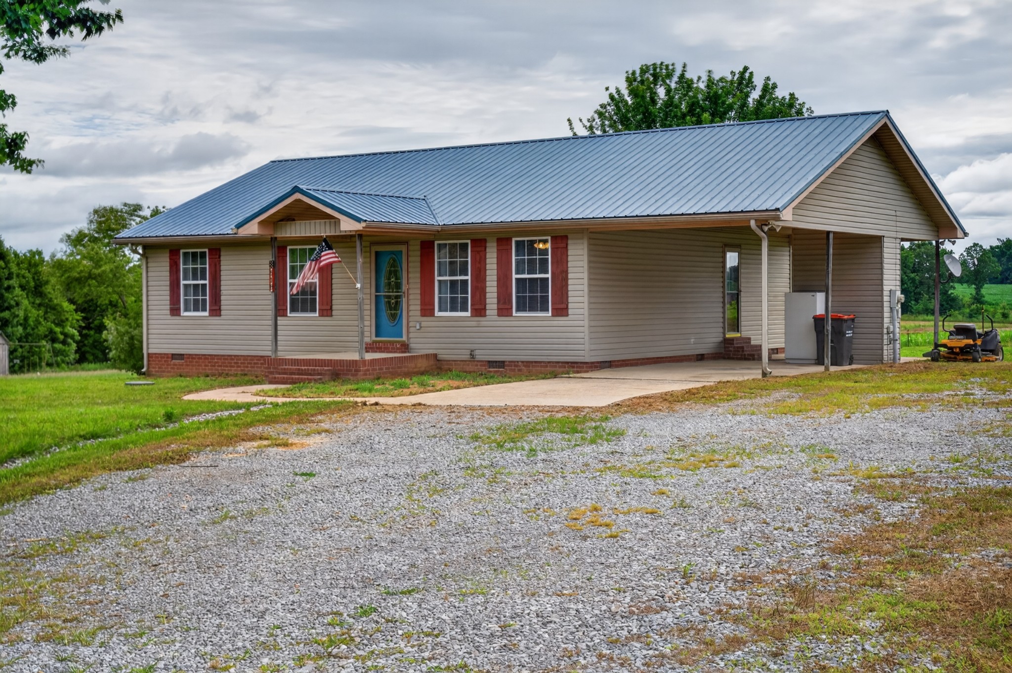 618 Lear Road Portland, TN 37148 - Photo 3 of 29 a front view of a house with a yard
