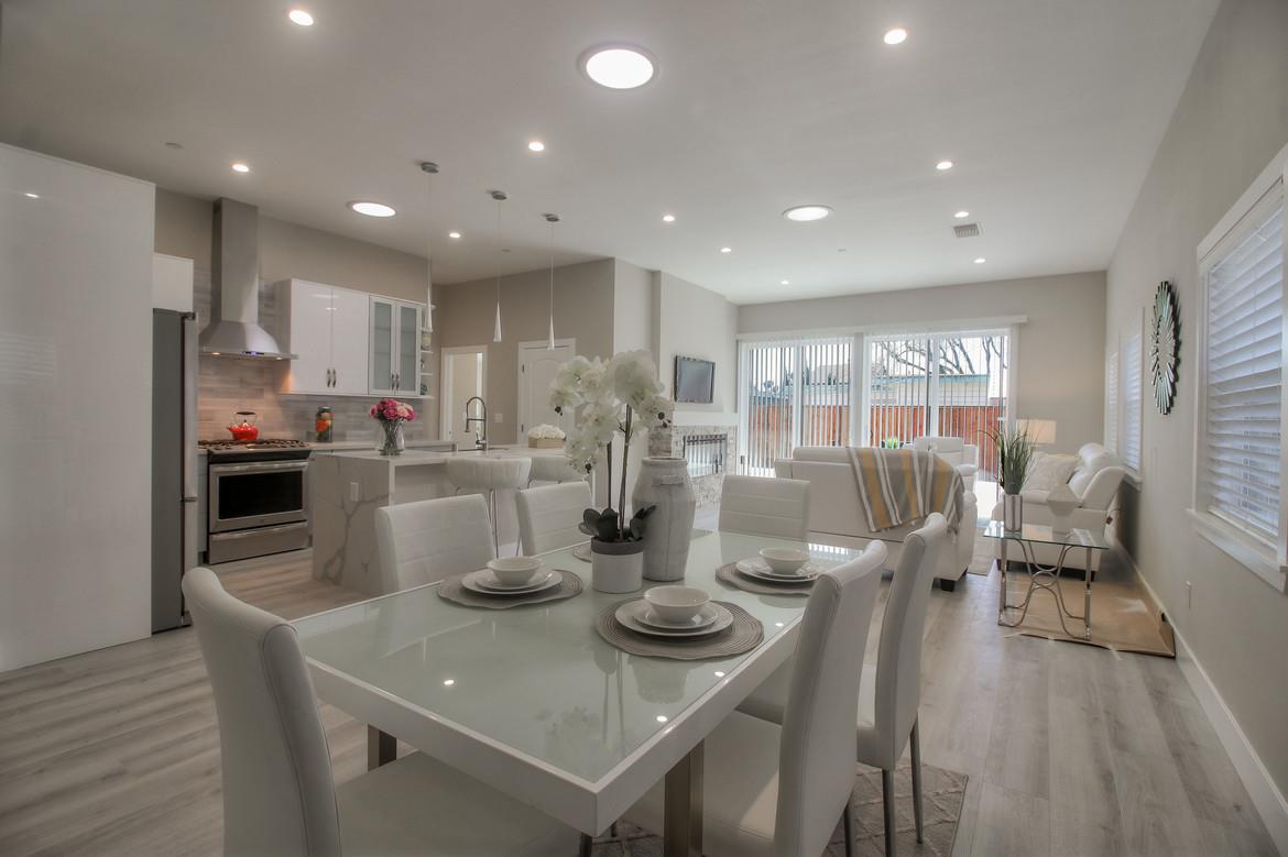 856 Howe Street San Mateo, CA 94401 - Photo 14 of 32 a kitchen with refrigerator and stove