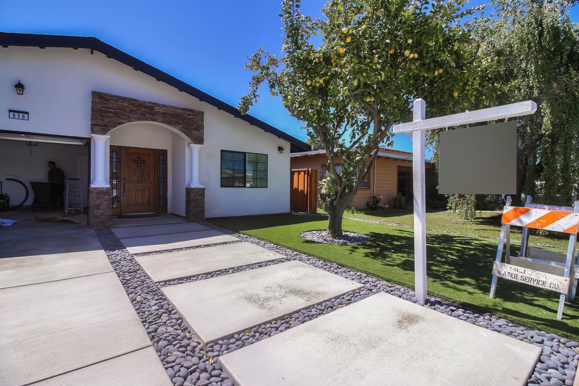 856 Howe Street San Mateo, CA 94401 - Photo 2 of 32 a view of a porch with furniture and a yard