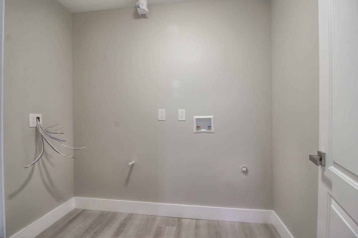 856 Howe Street San Mateo, CA 94401 - Photo 28 of 32 a view of small space with racks on the wall