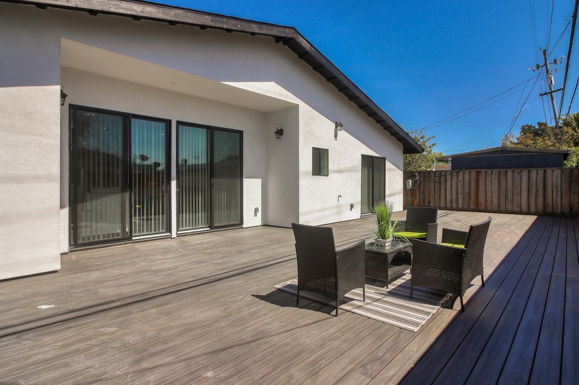 856 Howe Street San Mateo, CA 94401 - Photo 29 of 32 a view of backyard with a patio and outdoor seating