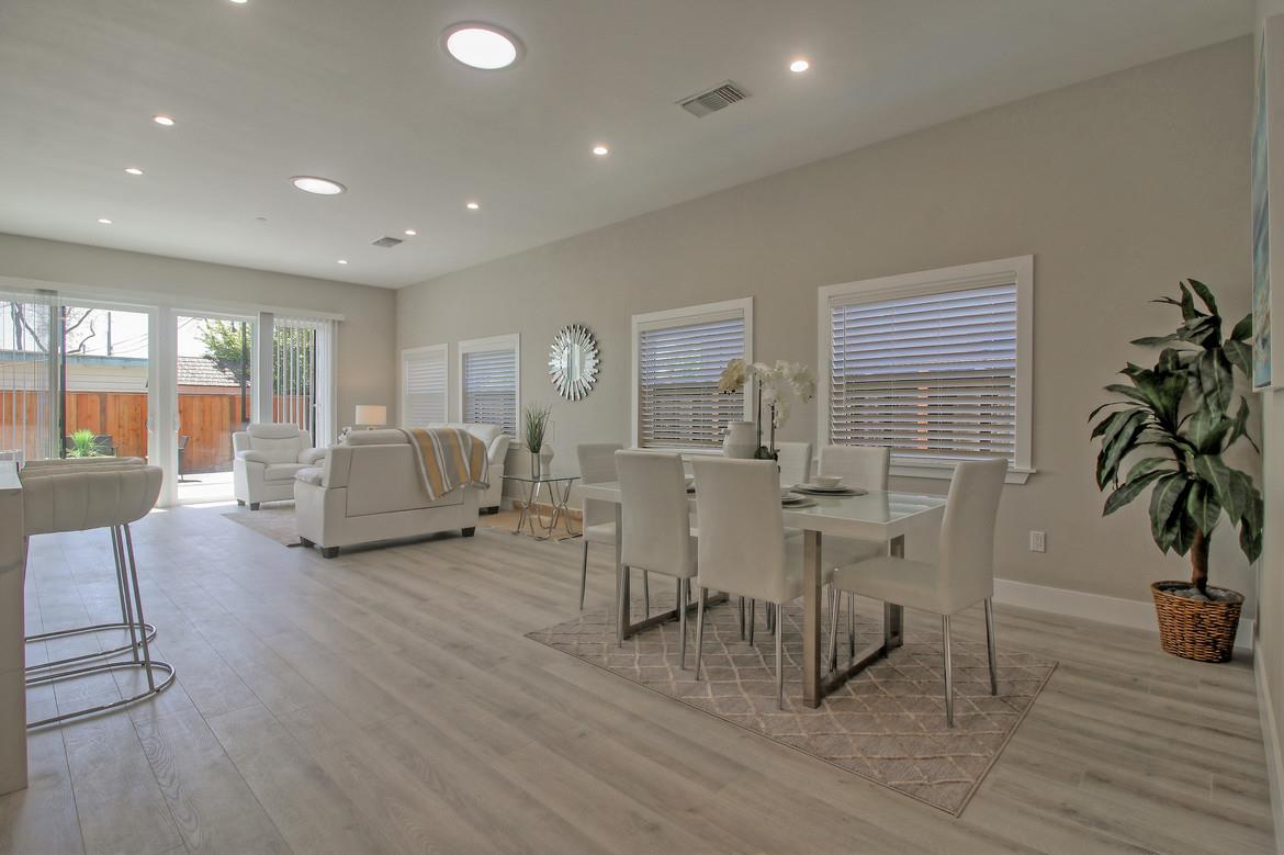 856 Howe Street San Mateo, CA 94401 - Photo 7 of 32 a living room with furniture and wooden floor