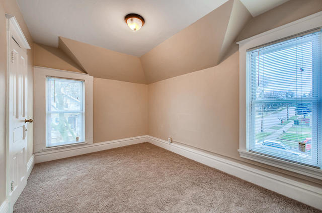473 North Spring Street Elgin, IL 60120 - Photo 12 of 16 an empty room with windows