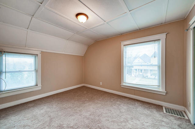 473 North Spring Street Elgin, IL 60120 - Photo 14 of 16 an empty room with a window
