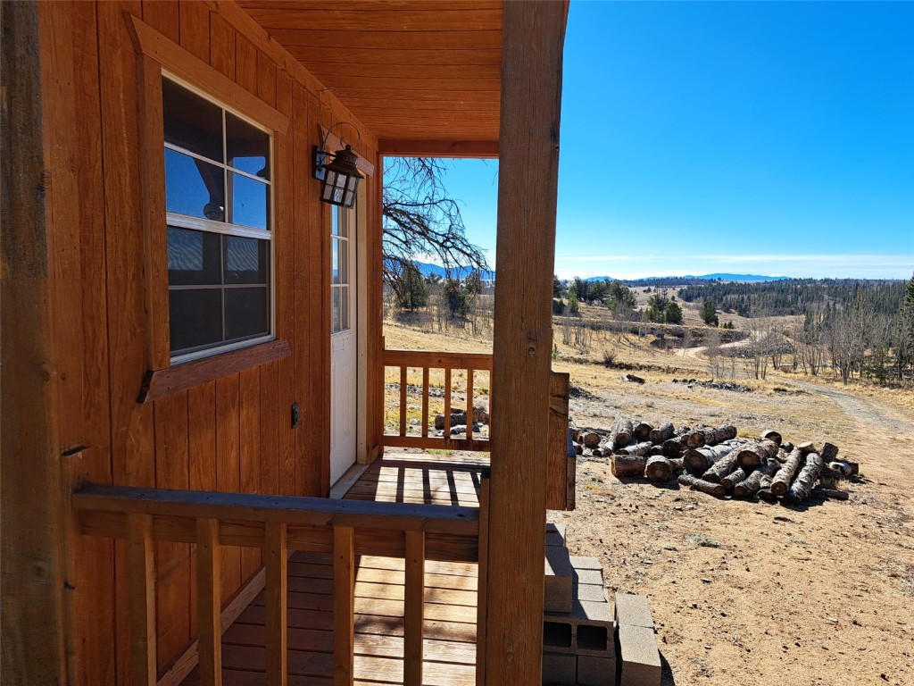 209 Crooked Rock Path Como, CO 80456 - Photo 11 of 17 a view of a balcony and a yard