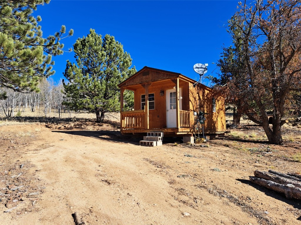 209 Crooked Rock Path Como, CO 80456 - Photo 4 of 17 a view of a house with snow on the ground