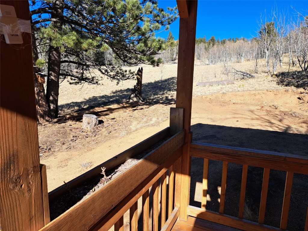 209 Crooked Rock Path Como, CO 80456 - Photo 10 of 17 a view of a road from a balcony